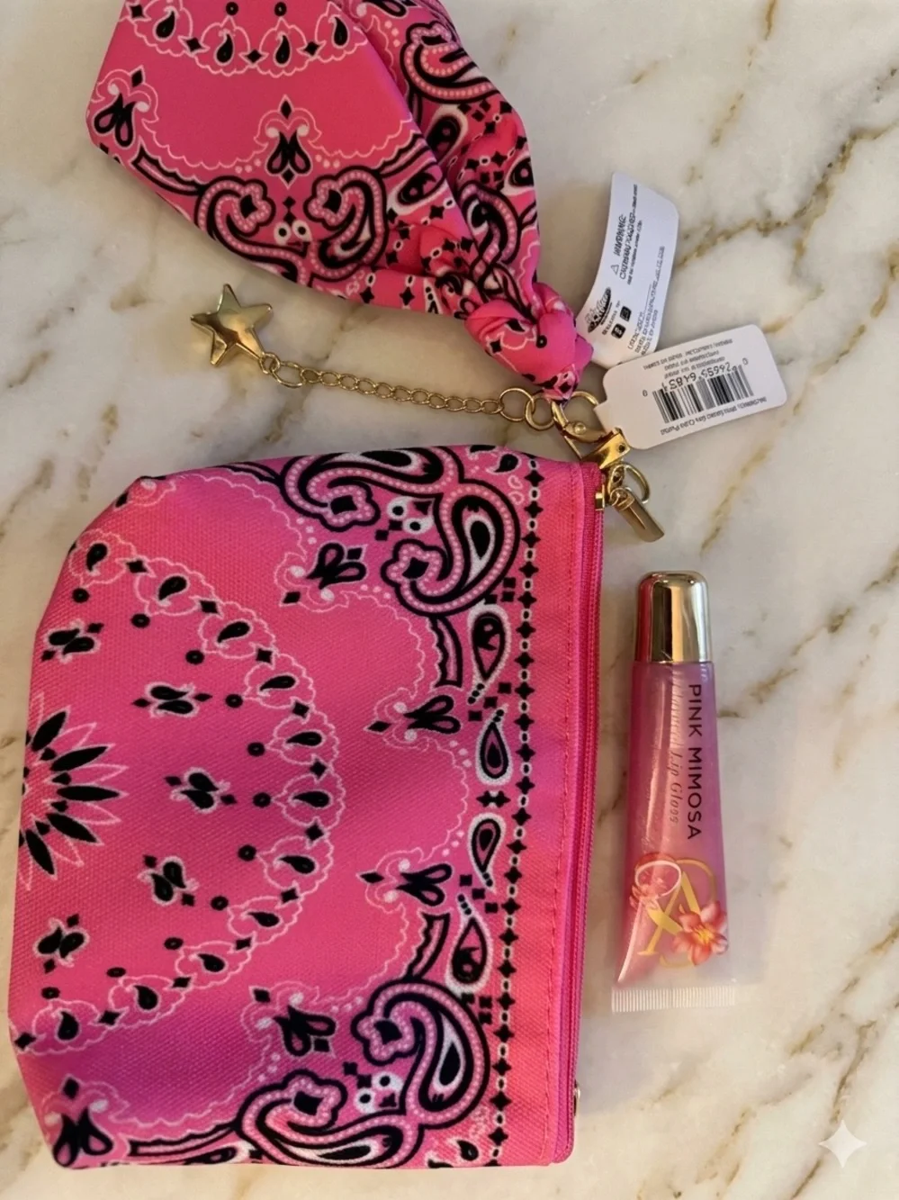 Pink Bandana Print Wristlet Pouch with Star Charm and lip gloss